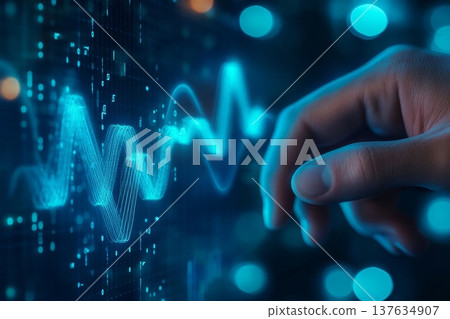 A Human Hand Interacting with a Digital Wave on a Futuristic Touchscreen Interface 137634907