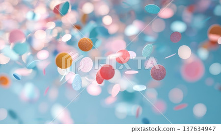 Vibrant confetti filled balloons gracefully floating in the air, creating a festive and celebratory atmosphere. 137634947