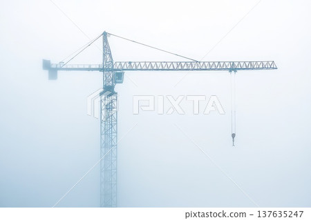 Crane Lifting Worker High Above Ground in Construction Site, Showcasing Heavy Machinery and Safety Measures Crane Lifting Worker High Above Ground in Construction Site, Showcasing Heavy Machinery and Safety Measures 137635247