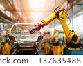 An industrial robot welds a car frame on a modern automated assembly line in an automotive factory. 137635488