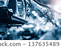 An industrial robot welds a car frame on a modern automated assembly line in an automotive factory. 137635489
