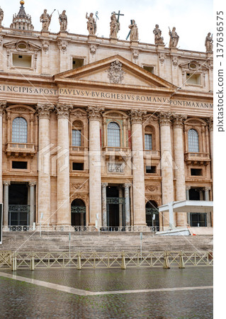 Visitors explore St. Peter's Basilica in Vatican City on a rainy afternoon Visitors explore St. Peter's Basilica in Vatican City on a rainy afternoon 137636575