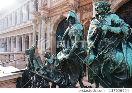 Statues on a balcony in Venice during the morning light hours Statues on a balcony in Venice during the morning light hours 137636994