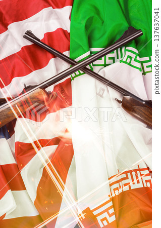 Conflict between Iran and USA represented with flags and crossed rifles in a tense setting 137637041