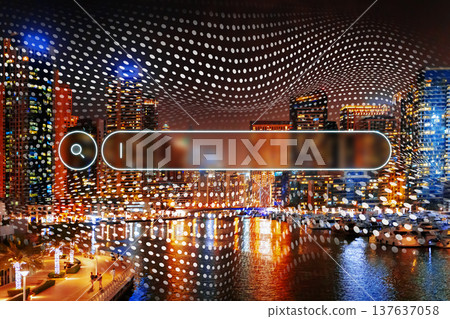 City skyline with digital elements overlaid at night near the water City skyline with digital elements overlaid at night near the water 137637058