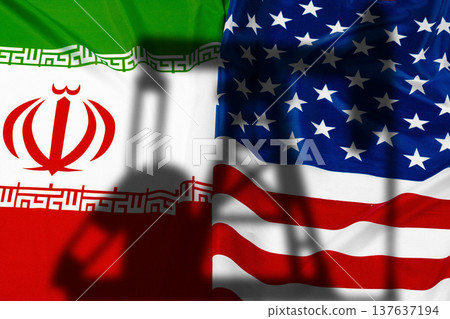 Flags of Iran and USA symbolizing conflict and tension between the two nations Flags of Iran and USA symbolizing conflict and tension between the two nations 137637194