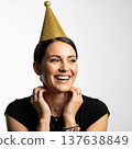 Laughing Woman in Black Shirt and Gold Party Hat on White Background 137638849
