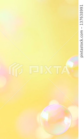 Yellow shining soap bubbles and light bokeh background. Bright pastel abstract material. 137638991