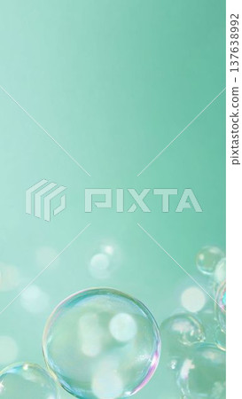 Green soap bubbles and a blurred background of light; refreshing pastel abstract material. Green soap bubbles and a blurred background of light; refreshing pastel abstract material. 137638992
