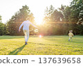 Dad daughter. Father child bonding moment in green park. 137639658