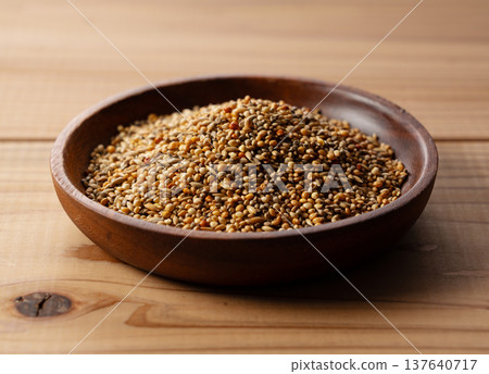 Bird food served on a wooden plate 137640717
