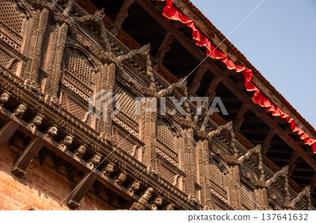 Part of the Palace of Fifty-Five Windows is one of the most beautiful architectural features of the Bhaktapur durbar square, Nepal. 137641632