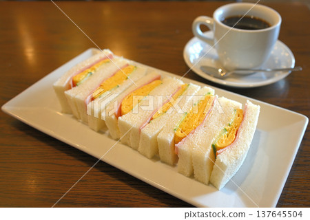 Egg sandwich and coffee breakfast 2 137645504