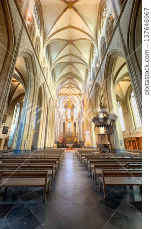 Halle, Belgium, September 10th, 2025, Serene worship space featuring ornate arches and colorful 137646967