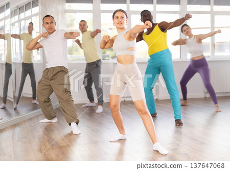Group of people dancing modern dances Group of people dancing modern dances 137647068