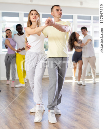 Young man and woman dancing latin dances Young man and woman dancing latin dances 137647259