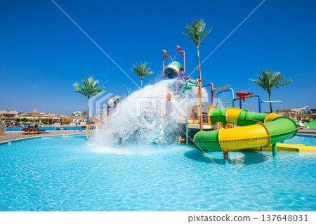 swimming pool with coconut tree and white umbrella 137648031