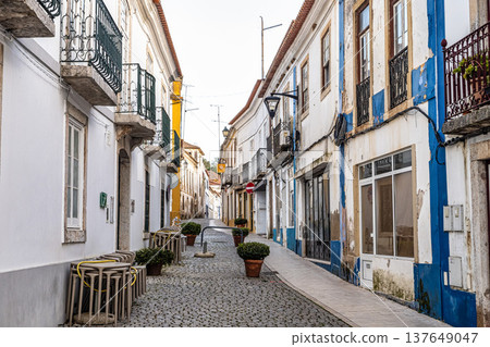 Odemira, Portugal - Feb 24, 2026: Narrow street with old white houses at village Odemira in Portugal Odemira, Portugal - Feb 24, 2026: Narrow street with old white houses at village Odemira in Portugal 137649047