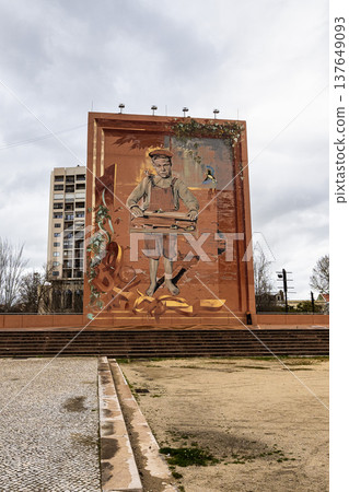 Setubal, Portugal - Mar 02, 2026: The mural The Boy with the Birds was considered the best mural of 2014 in Setubal, Portugal. 137649093