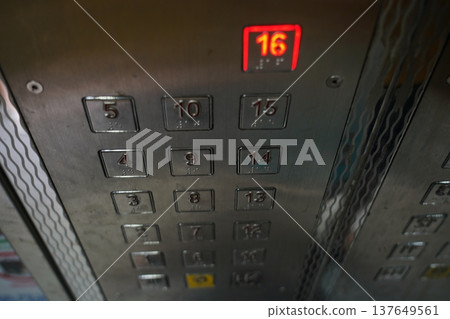 Elevator Panel with Illuminated Floor Number Sixteen Elevator Panel with Illuminated Floor Number Sixteen 137649561