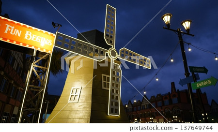 Fun Begins at Nighttime Destination with Windmill Fun Begins at Nighttime Destination with Windmill 137649744