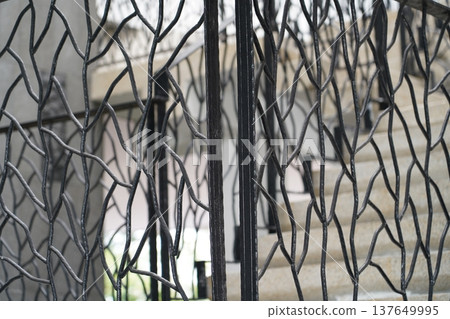 Intricate Ironwork Design on a Gate or Railing 137649995