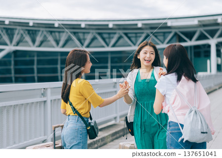 Female friends reuniting at the airport (Photo courtesy of Kansai International Airport (KIX)) Female friends reuniting at the airport (Photo courtesy of Kansai International Airport (KIX)) 137651041