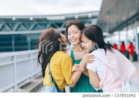Female friends reuniting at the airport (Photo courtesy of Kansai International Airport (KIX)) Female friends reuniting at the airport (Photo courtesy of Kansai International Airport (KIX)) 137651042