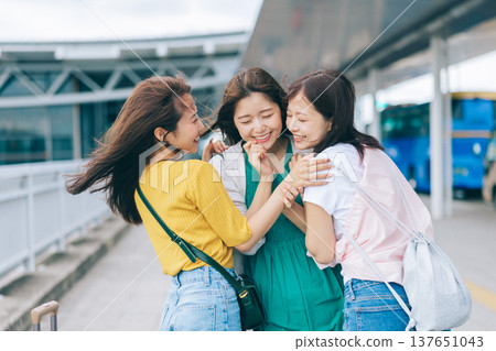 Female friends reuniting at the airport (Photo courtesy of Kansai International Airport (KIX)) Female friends reuniting at the airport (Photo courtesy of Kansai International Airport (KIX)) 137651043