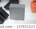 Products made from foamed polymers expanded polypropylene EPP and expanded polystyrene EPS. Model of dense and lightweight material, universal foam. New modern technologies. Industrial manufacturing 137651523