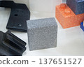 Products made from foamed polymers expanded polypropylene EPP and expanded polystyrene EPS. Model of dense and lightweight material, universal foam. New modern technologies. Industrial manufacturing 137651527