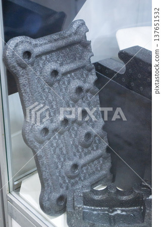 Products made from foamed polymers expanded polypropylene EPP and expanded polystyrene EPS. Model of dense and lightweight material, universal foam. New modern technologies. Industrial manufacturing 137651532