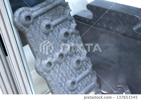 Products made from foamed polymers expanded polypropylene EPP and expanded polystyrene EPS. Model of dense and lightweight material, universal foam. New modern technologies. Industrial manufacturing 137651545