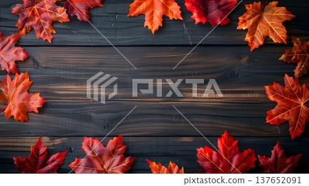 Autumn background on a wooden board adorned with colorful autumn leaves 137652091