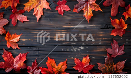 Autumn background on a wooden board adorned with colorful autumn leaves 137652092