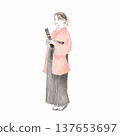 A woman in a hakama holding a diploma 137653697