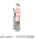 A woman in a hakama holding a diploma 137653698