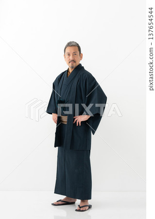 A man wearing a kimono 137654544