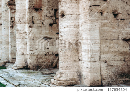 Columns support a structure in an ancient site during daylight hours in a historical location 137654804