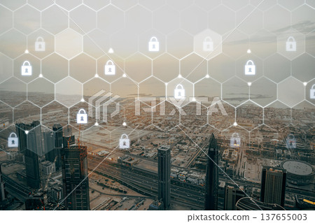 View of a city skyline with digital security icons overlaid on a summer afternoon View of a city skyline with digital security icons overlaid on a summer afternoon 137655003