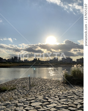 Sunset viewed from the river 137655197