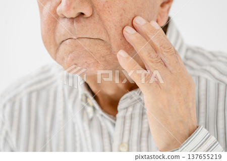 Senior men with nasolabial folds 137655219