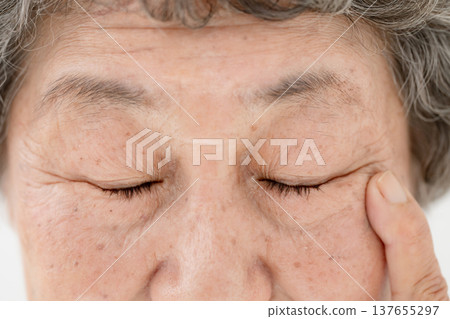 Senior woman eyes 137655297