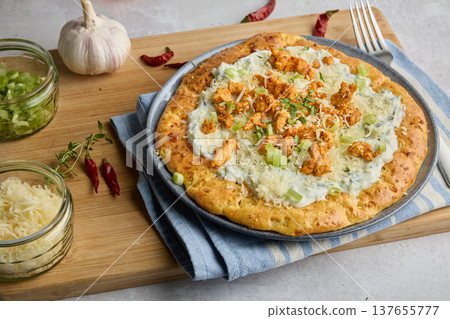 Hungarian Langos Flatbread with Garlic Sauce and Cheese Hungarian Langos Flatbread with Garlic Sauce and Cheese 137655777