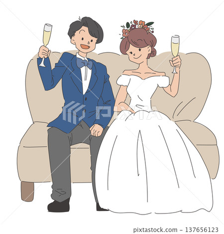The bride and groom toast while sitting on the sofa. 137656123
