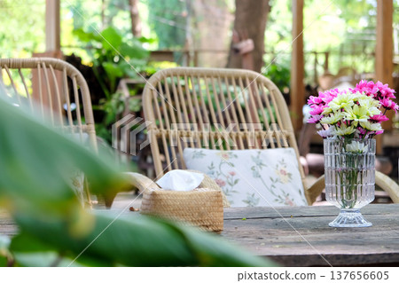 flowers bouquet on wooden garden table 137656605