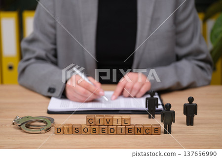Exploring the concept of civil disobedience through meaningful actions in a modern office setting Exploring the concept of civil disobedience through meaningful actions in a modern office setting 137656990