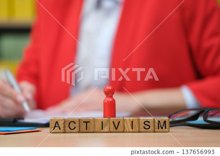 Empowering thoughts capture the essence of activism in a vibrant workspace during a sunny afternoon 137656993