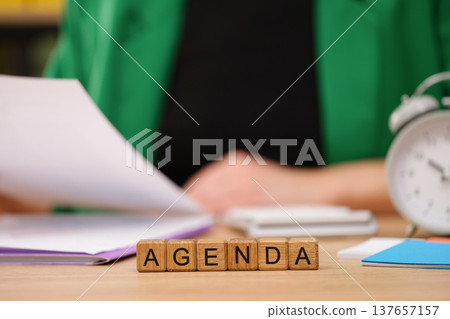 Planning a productive morning with a clear agenda and a ticking clock in a cozy workspace Planning a productive morning with a clear agenda and a ticking clock in a cozy workspace 137657157