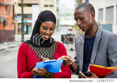 portrait of young business people. portrait of young business people. 137657577